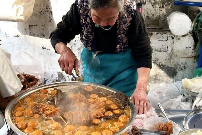 Luang Prabang Evening Food Tour by Tuk-Tuk - BBQ where you grill your own meat: the hands-on highlight