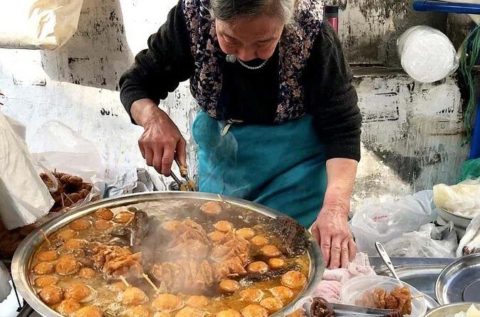Luang Prabang Evening Food Tour by Tuk-Tuk - Hot pot and charcoal-style meals: comfort food, but done right
