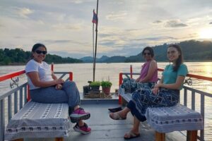 Luang Prabang Mekong Sunset Cruise and Hot Pot Dinner - The 2-hour Mekong slow boat: sunset views and local river context