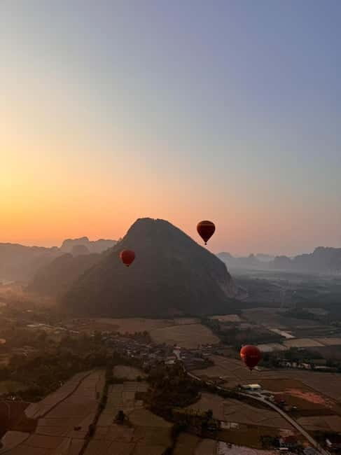 Vang Vieng: Hot Air Balloon Ride with City Hotel Pickup - Getting There: City Hotel Pickup by Tuk-Tuk